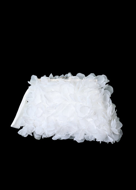 White floral headband on a black background