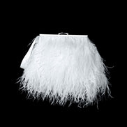 White feathered clutch bag on a black background