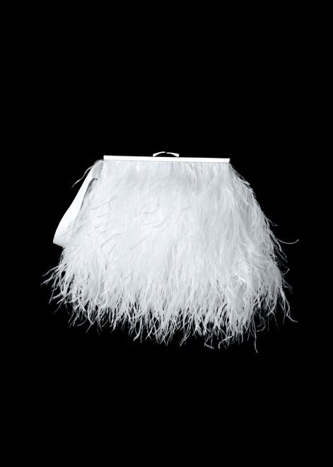 White feathered clutch bag on a black background
